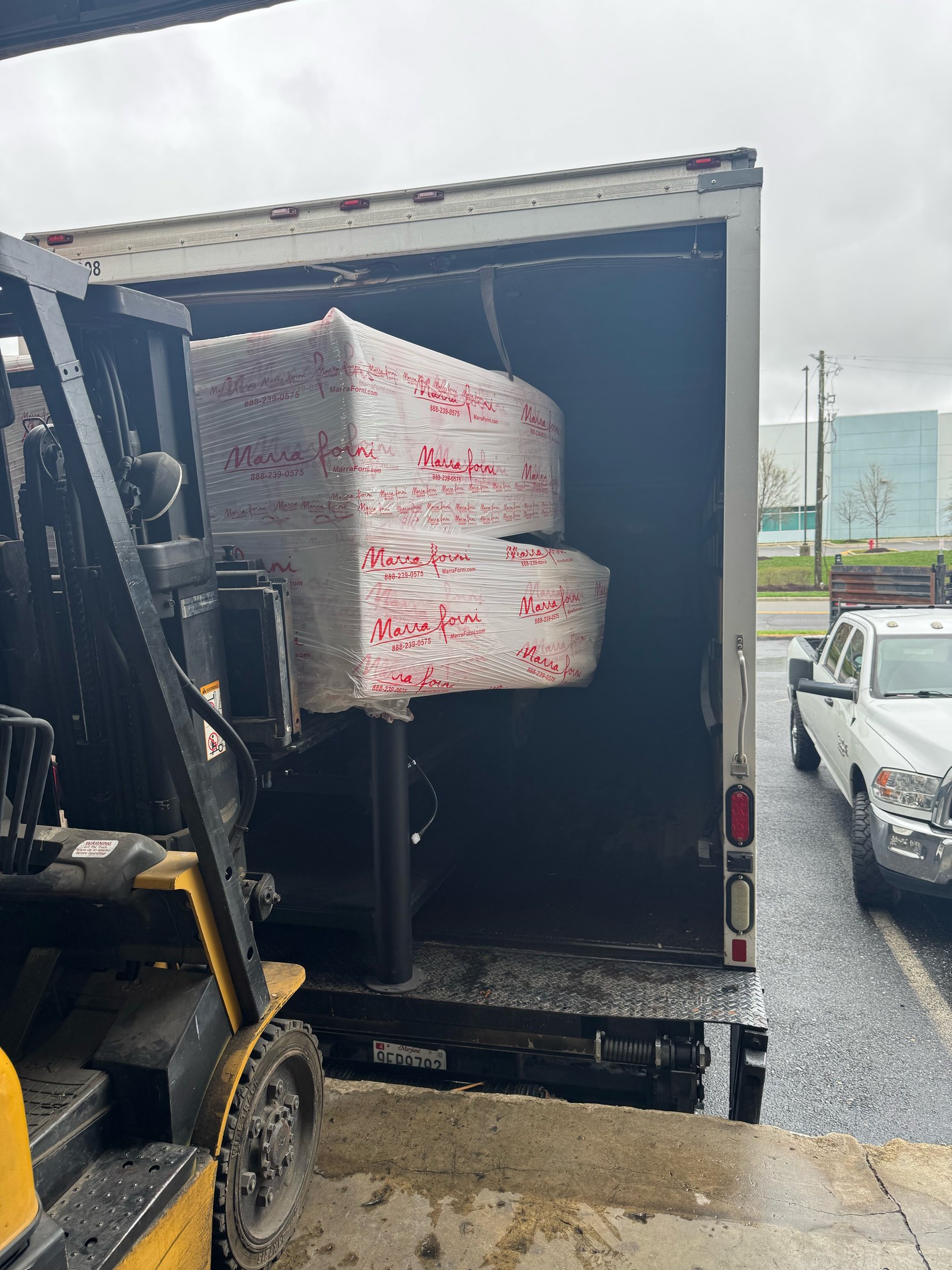 Marra Forni brick oven wrapped and loaded into a box truck for delivery — NLI